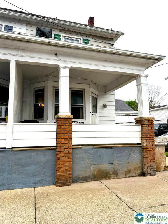 213 Main St, Pen Argyl Borough, PA 18072 - view of front of house with a porch