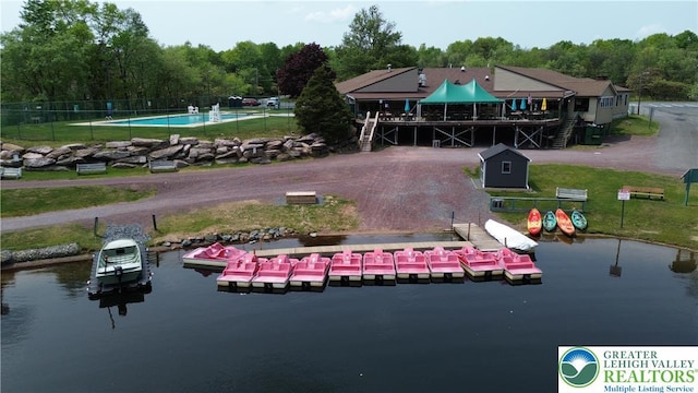 view of subject property with a large body of water