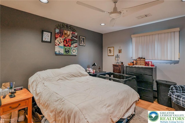 bedroom featuring recessed lighting, ceiling fan, and light wood finished floors