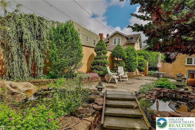 view of yard with a patio area