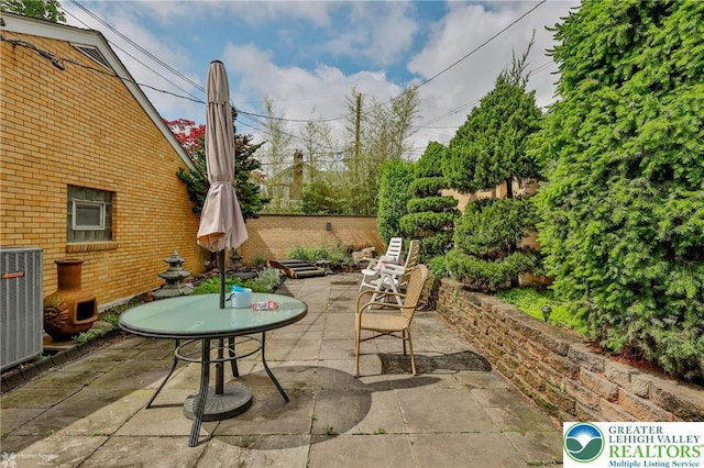 view of patio featuring cooling unit