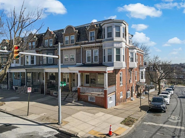 view of front facade with a porch and a residential view