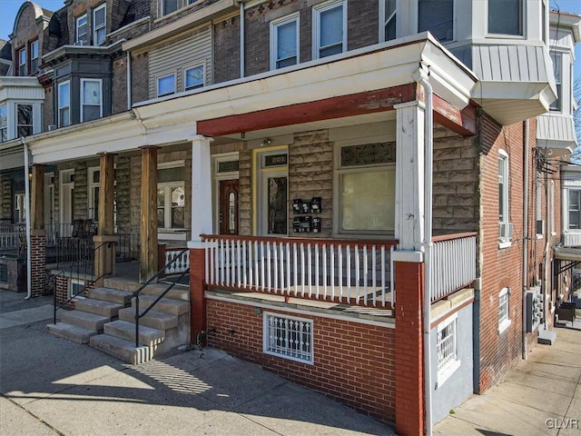 property entrance with a porch