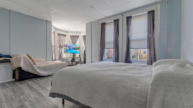 bedroom featuring wood finished floors