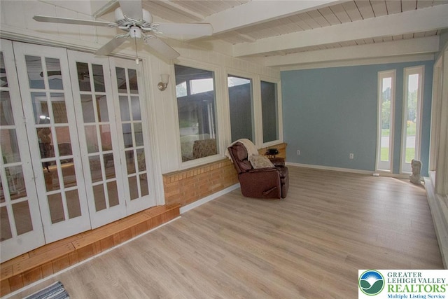 1115 N 38th St, South Whitehall Twp, PA 18104 - unfurnished sunroom featuring french doors, wood finished floors, beamed ceiling, and baseboards