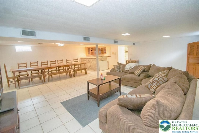 1115 N 38th St, South Whitehall Twp, PA 18104 - living room with light tile patterned floors