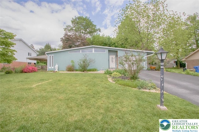 1115 N 38th St, South Whitehall Twp, PA 18104 - mid-century home with a front lawn