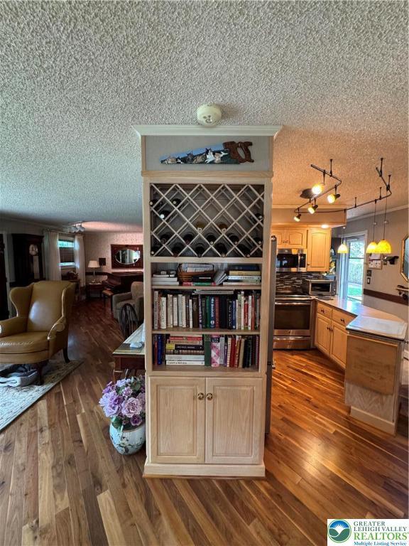 1472 Bearcat, Cove, PA 17922 - dining room featuring a textured ceiling and dark wood-style floors
