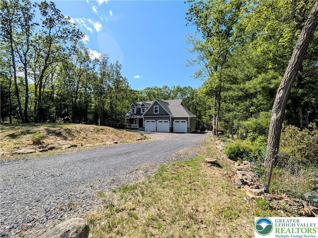 130 Corktree Rd, Polk Twp, PA 18058 - view of front facade with a garage and driveway