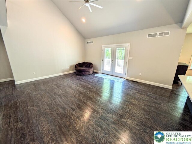 130 Corktree Rd, Polk Twp, PA 18058 - unfurnished living room featuring french doors, a ceiling fan, dark wood finished floors, high vaulted ceiling, and baseboards