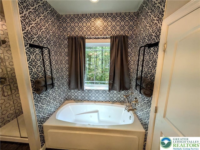 130 Corktree Rd, Polk Twp, PA 18058 - bathroom featuring a tub with jets and a tile shower