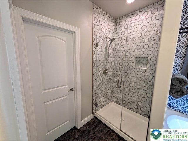 130 Corktree Rd, Polk Twp, PA 18058 - bathroom featuring a shower stall, wood finished floors, and baseboards