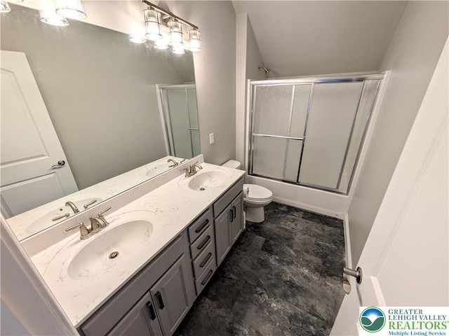 130 Corktree Rd, Polk Twp, PA 18058 - full bathroom featuring toilet, double vanity, and combined bath / shower with glass door
