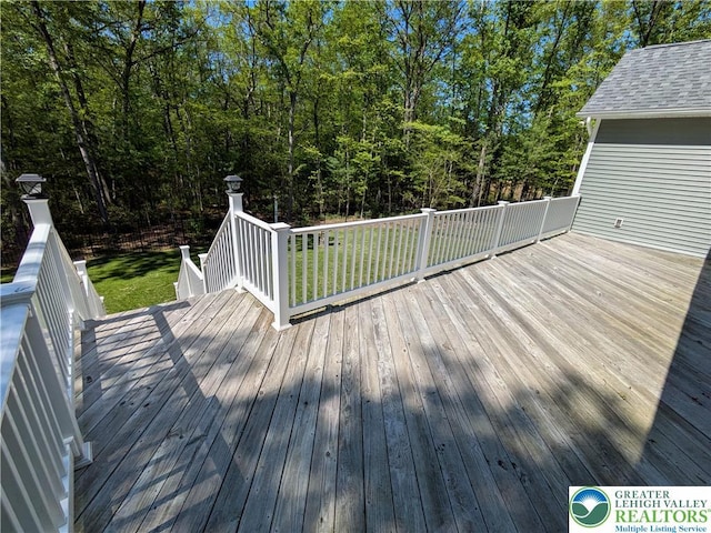 130 Corktree Rd, Polk Twp, PA 18058 - wooden deck with a lawn