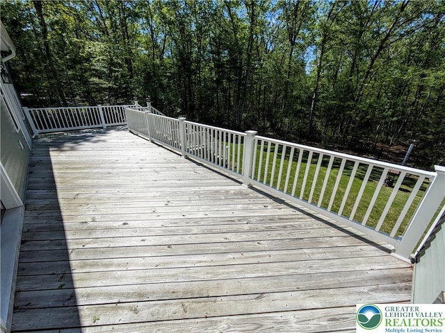 130 Corktree Rd, Polk Twp, PA 18058 - wooden deck with a lawn