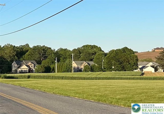 view of community with a lawn