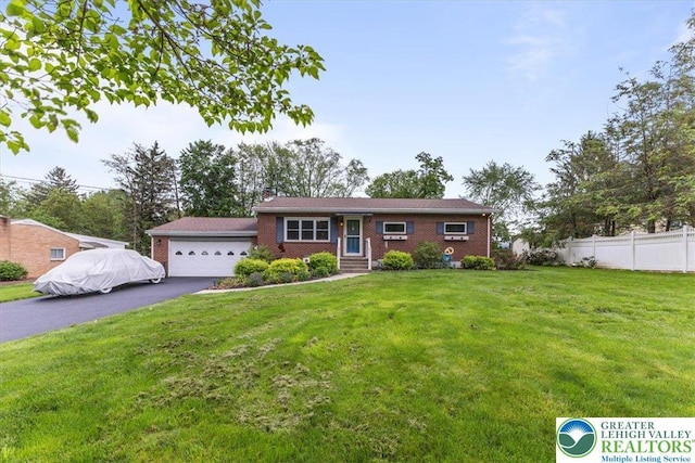 2840 Whitewood Rd, Hanover Twp, PA 18017 - ranch-style house with an attached garage, asphalt driveway, and brick siding