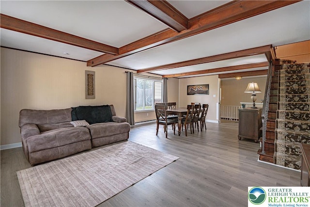 3082 Pricetown Rd, Pa, PA 19560 - living room with beam ceiling, baseboards, wood finished floors, and a baseboard heating unit