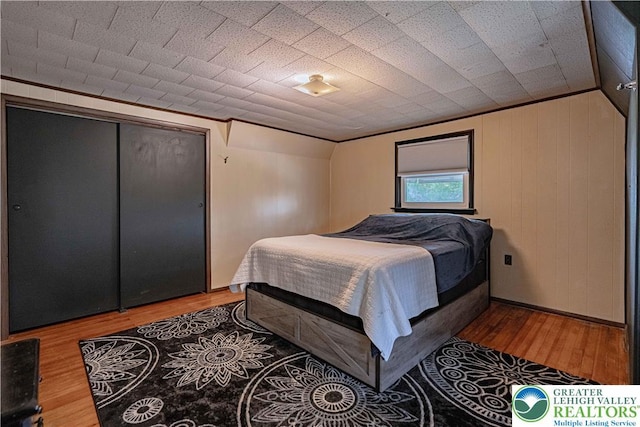3082 Pricetown Rd, Pa, PA 19560 - bedroom featuring wood finished floors and wooden walls