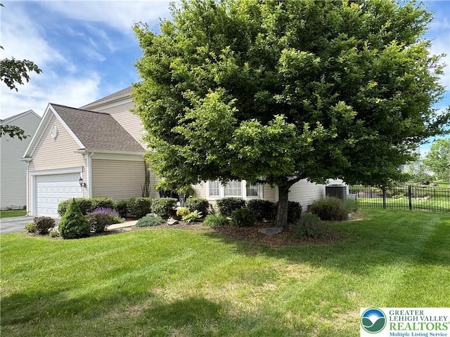 1557 Bridgeton Rd, Upper Macungie Twp, PA 18031 - obstructed view of property featuring an attached garage, driveway, and roof with shingles