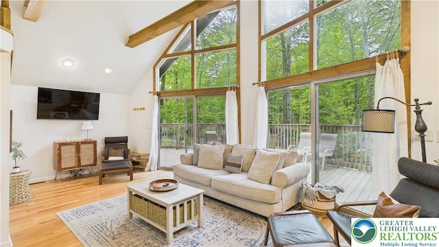112 Moshannon Dr, Coolbaugh Twp, PA 18347 - living room featuring high vaulted ceiling, beam ceiling, wood finished floors, baseboards, and recessed lighting