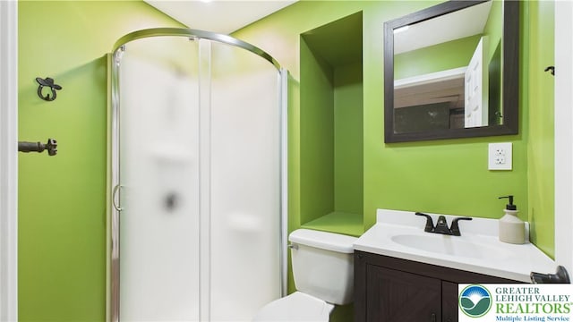 112 Moshannon Dr, Coolbaugh Twp, PA 18347 - full bathroom featuring toilet, vanity, and a shower with door