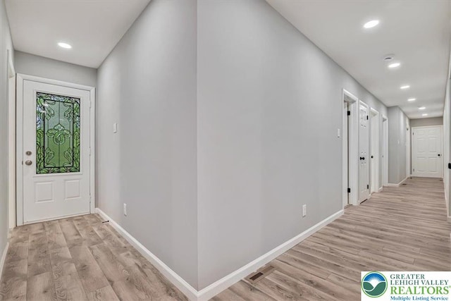 5653 Sullivan Trl, Plainfield Twp, PA 18064 - entryway with light wood-style flooring, recessed lighting, and baseboards