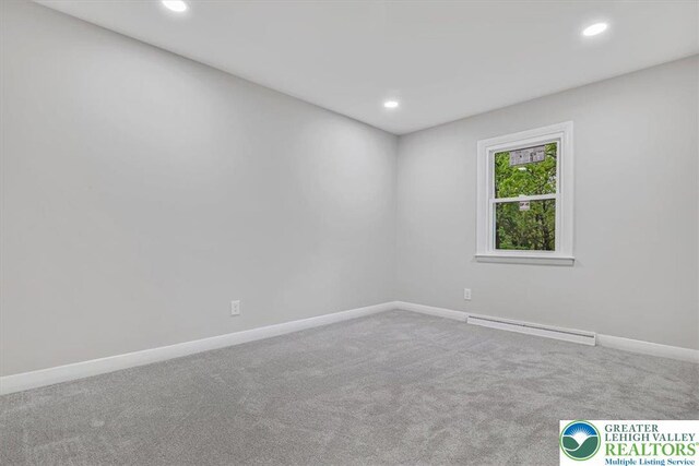 5653 Sullivan Trl, Plainfield Twp, PA 18064 - carpeted spare room with a baseboard radiator, recessed lighting, and baseboards