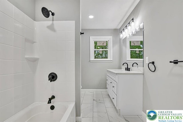 5653 Sullivan Trl, Plainfield Twp, PA 18064 - full bath with marble finish flooring, vanity, baseboards, shower / bath combination, and recessed lighting