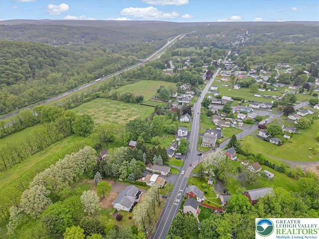 5653 Sullivan Trl, Plainfield Twp, PA 18064 - aerial view of residential area featuring a forest