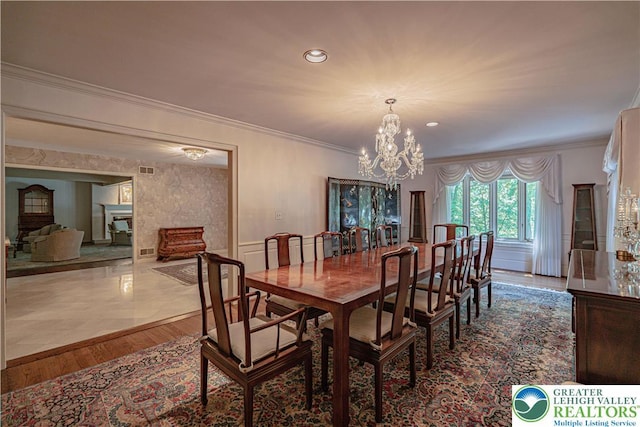1845 Lehigh Pkwy N, Allentown City, PA 18103 - dining room featuring a chandelier, ornamental molding, recessed lighting, and a fireplace