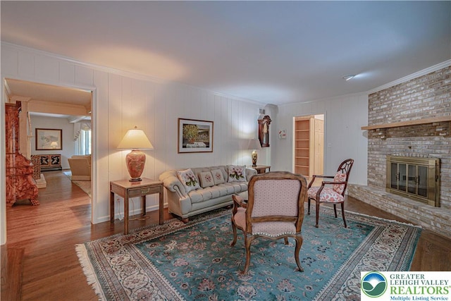 1845 Lehigh Pkwy N, Allentown City, PA 18103 - living area with crown molding, wood finished floors, and a fireplace