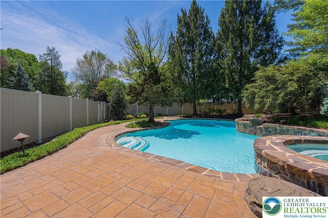 1845 Lehigh Pkwy N, Allentown City, PA 18103 - view of swimming pool featuring an in-ground hot tub, a fenced backyard, and a patio area