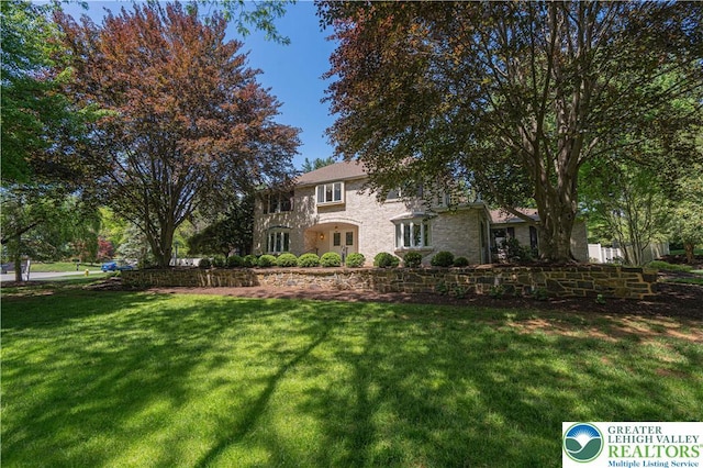 1845 Lehigh Pkwy N, Allentown City, PA 18103 - back of house featuring a lawn and stone siding