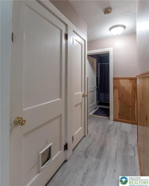 46 Jefferson St, Weatherly Borough, PA 18255 - hall featuring a wainscoted wall, light wood-style flooring, and wooden walls