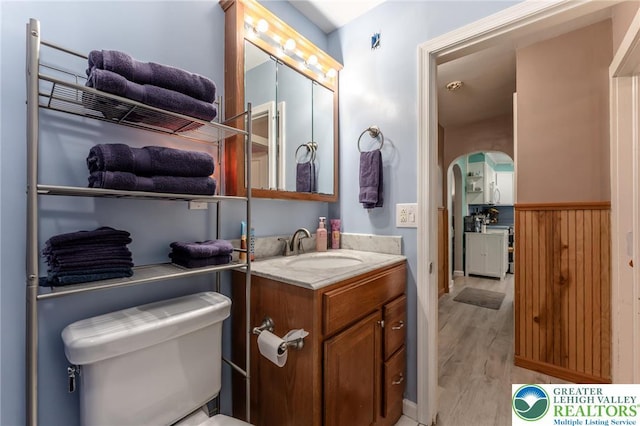 46 Jefferson St, Weatherly Borough, PA 18255 - bathroom featuring wood finished floors, vanity, and toilet