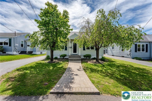 46 Jefferson St, Weatherly Borough, PA 18255 - obstructed view of property featuring a front lawn