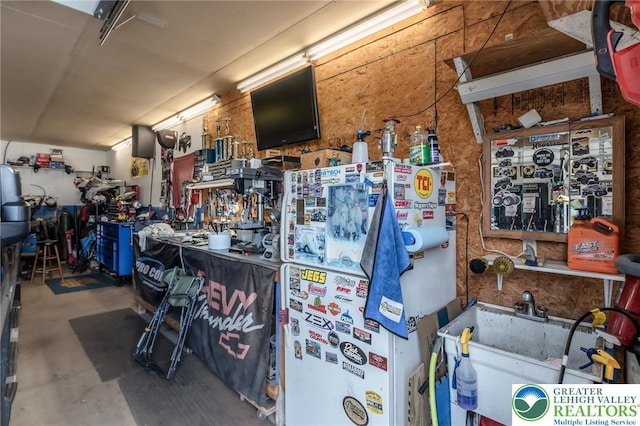 46 Jefferson St, Weatherly Borough, PA 18255 - garage with a workshop area and a sink
