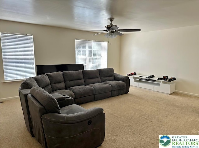 519 Lehigh Gap St, Walnutport Borough, PA 18088 - carpeted living area with plenty of natural light, ceiling fan, and baseboards