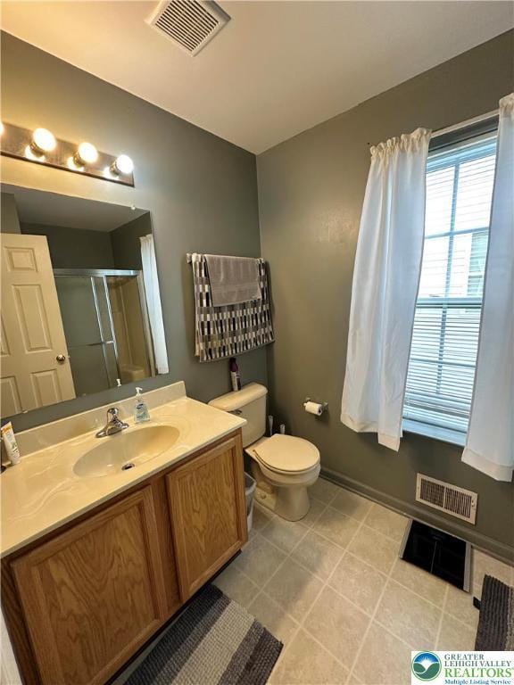 519 Lehigh Gap St, Walnutport Borough, PA 18088 - bathroom featuring a stall shower, vanity, toilet, and baseboards