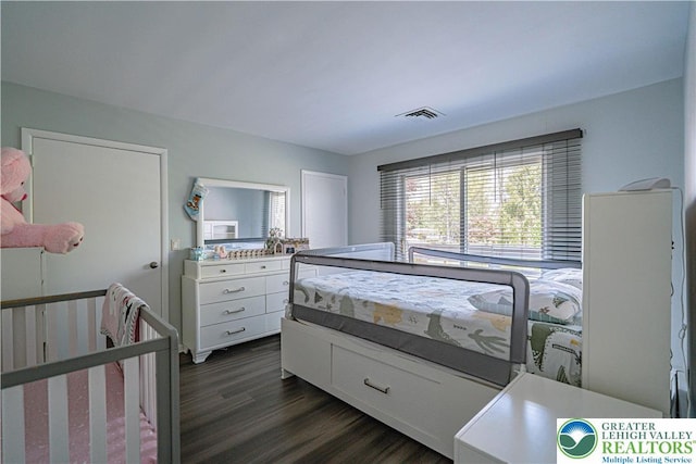 4205 Lehigh St, Whitehall Twp, PA 18052 - bedroom featuring dark wood finished floors