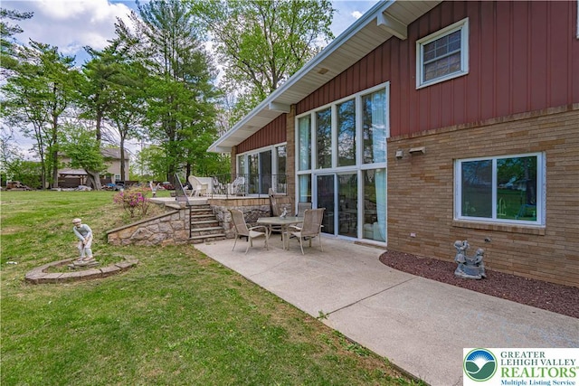 4205 Lehigh St, Whitehall Twp, PA 18052 - view of grassy yard with a patio area and a deck