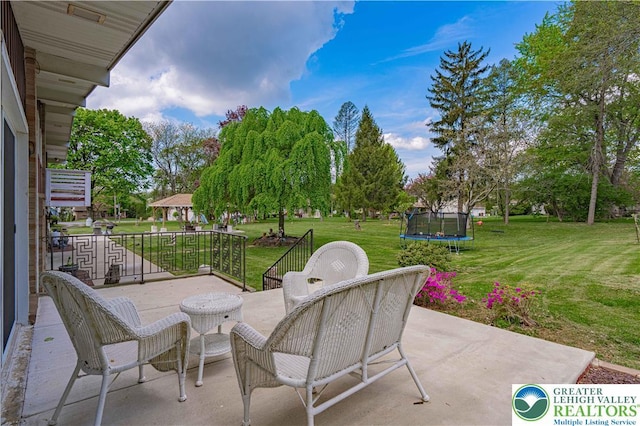 4205 Lehigh St, Whitehall Twp, PA 18052 - view of patio with a trampoline