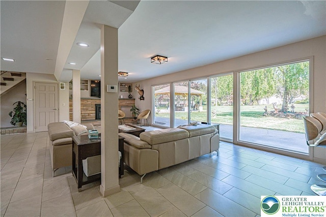 4205 Lehigh St, Whitehall Twp, PA 18052 - living area featuring light tile patterned flooring, recessed lighting, and a fireplace