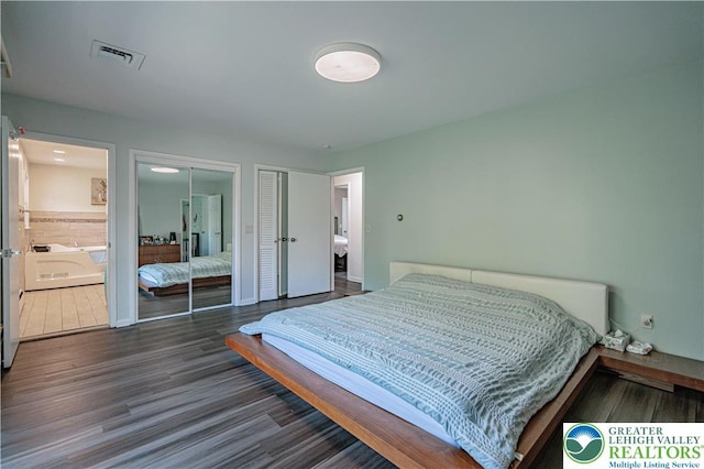 4205 Lehigh St, Whitehall Twp, PA 18052 - bedroom with dark wood-type flooring and two closets