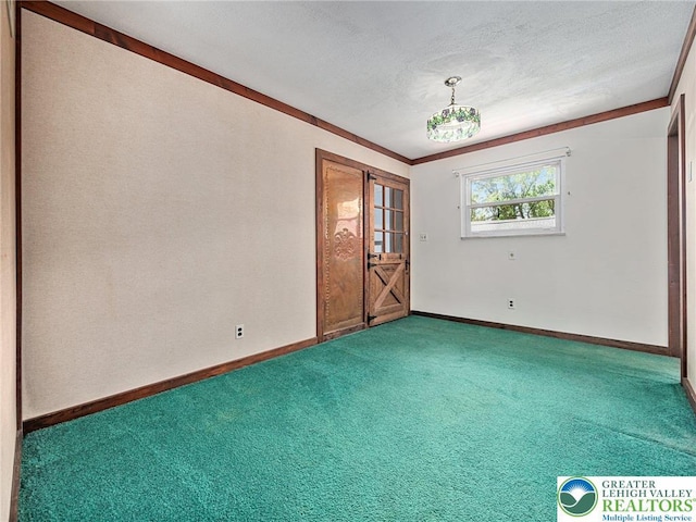 1218 Avocet Dr, Upper Macungie Twp, PA 18031 - unfurnished room featuring carpet floors, baseboards, and a textured ceiling