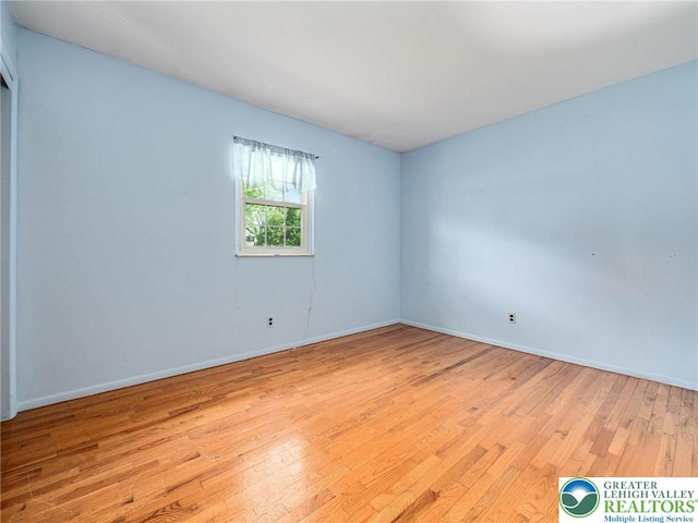 1218 Avocet Dr, Upper Macungie Twp, PA 18031 - spare room with light wood-style flooring and baseboards