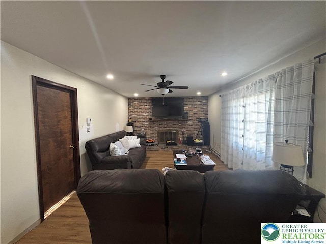 1882 S 2nd St, Allentown City, PA 18103 - living area with a ceiling fan, wood finished floors, a fireplace, recessed lighting, and baseboards