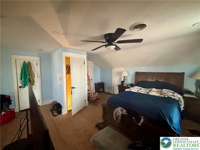1882 S 2nd St, Allentown City, PA 18103 - bedroom featuring wood finished floors, lofted ceiling, ceiling fan, and baseboards