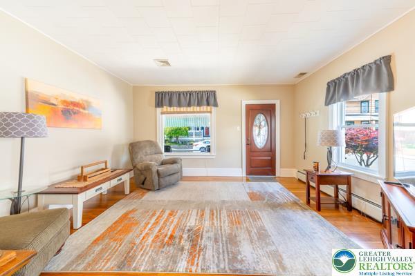 71 N 3rd St, Bangor Borough, PA 18013 - foyer with wood finished floors, baseboards, and a baseboard heating unit